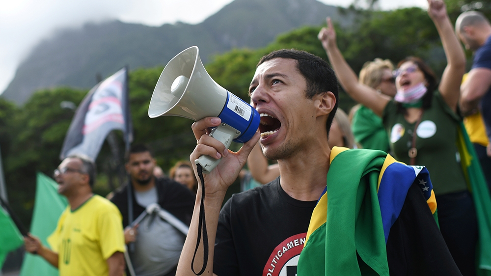 Demonstrators take part in a protest against Rio de Janeiro Governor Wilson Witzel's measures on the coronavirus disease (COVID-19) outbreak and in support of Brazil's President Jair Bolsonaro, in Rio