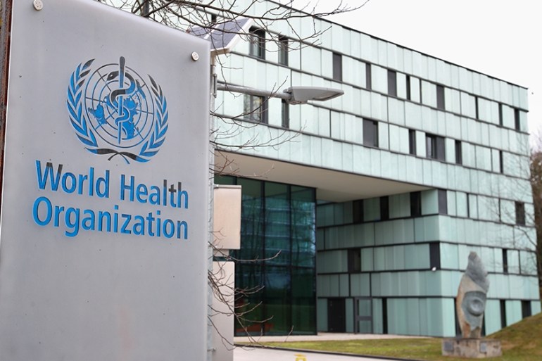 FILE PHOTO: A logo is pictured outside a building of the World Health Organization (WHO) during an executive board meeting on update on the coronavirus outbreak, in Geneva, Switzerland, February 6, 2