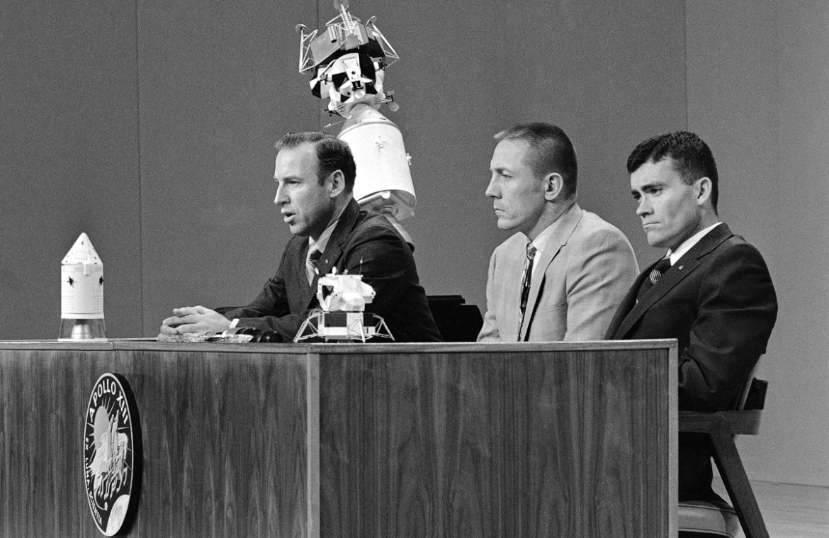 Apollo 13 commander James A. Lovell Jr., left, opens the astronauts televised news conference at the Manned Spacecraft Center, Houston, Tex., April 21, 1970 by saying ?I?m not a superstitious man? all