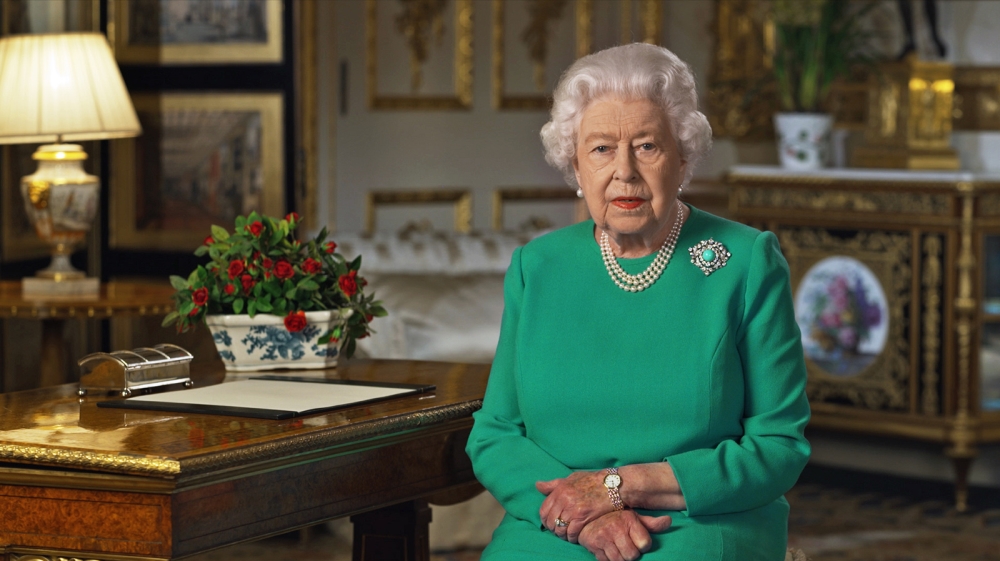 In a recent undated handout image released by Buckingham Palace on April 5, 2020 Britain's Queen Elizabeth II records her address to the UK and the Commonwealth in relation to the coronavirus epidemic