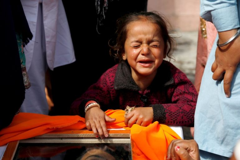 Afghan Sikh girl cries over the coffin of her mother who was killed during yesterday''s attack at Sikh religious complex in Kabul, Afghanistan