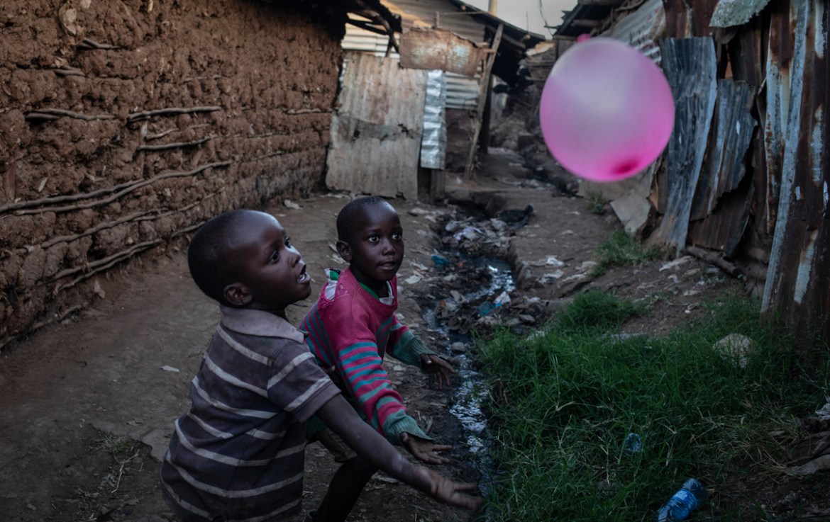 Children play by their home in the slum of Korogocho close to the Dandora rubbish dumpsite in the capital Nairobi, Kenya, February 18, 2019. A UN Environment study done on the health risks to people l