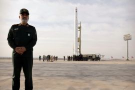 Amirali Hajizadeh, head of the aerospace division of the Revolutionary Guard, stands at the launch site of the first Nour by the IRGC in Semnan, Iran, on April 22, 2020 [WANA/Sepah News via Reuters]