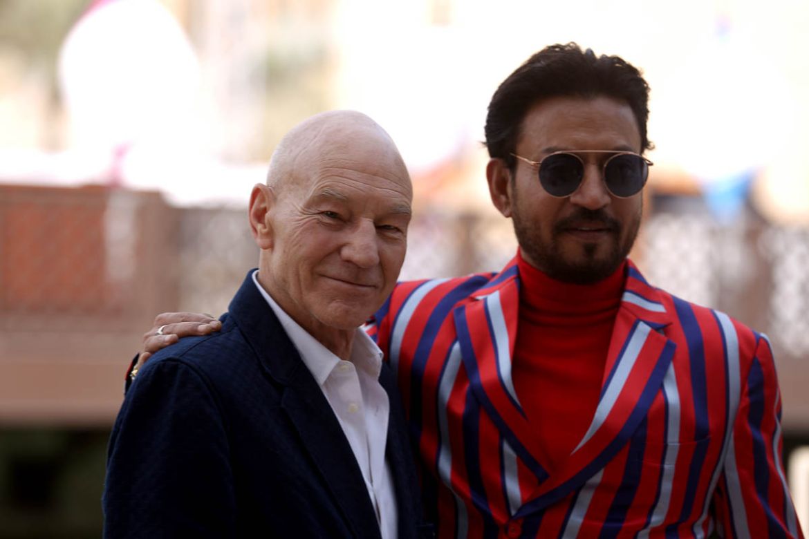 (FILES) In this file photo taken on December 08, 2017 British actor Sir Patrick Stewart and Indian actor Irrfan Khan pose during a photo call at the Dubai International Film Festival in Dubai. - Accla