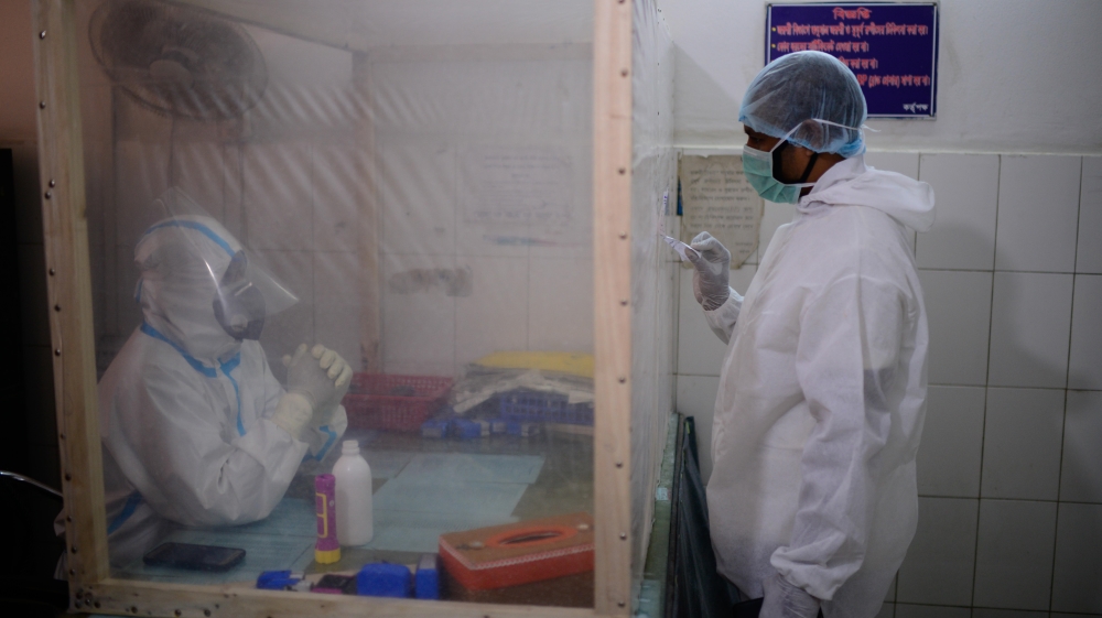 Bangladesh doctor's on duty during coronavirus [Mahmud Hossain Opu/Al Jazeera]