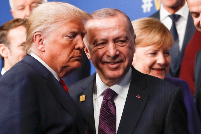 U.S. President Donald Trump and Turkey''s President Recep Tayyip Erdogan leave the stage after family photo during the annual NATO heads of government summit at the Grove Hotel in Watford