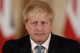 British Prime Minister Boris Johnson gives a press conference about the ongoing situation with the COVID-19 coronavirus outbreak inside 10 Downing Street in London, Tuesday, March 17, 2020. For most p