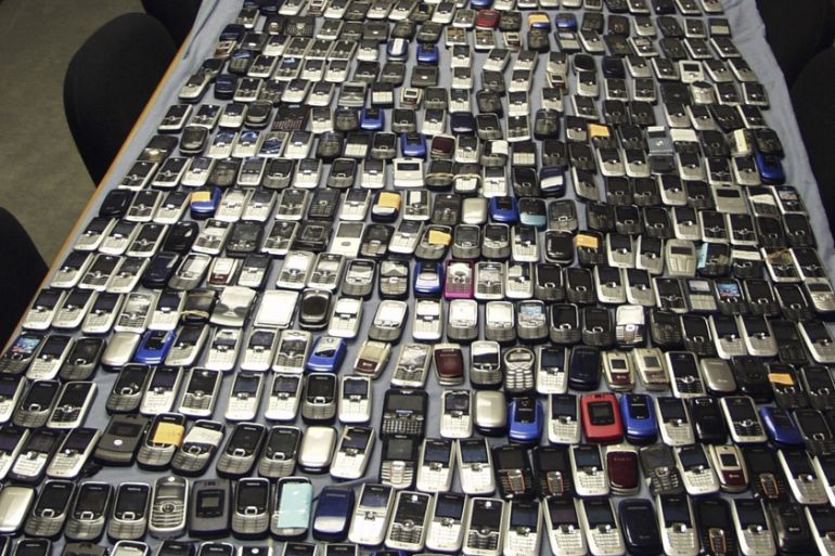 Handout photo shows mobile phones seized by Mississippi authorities at prisons