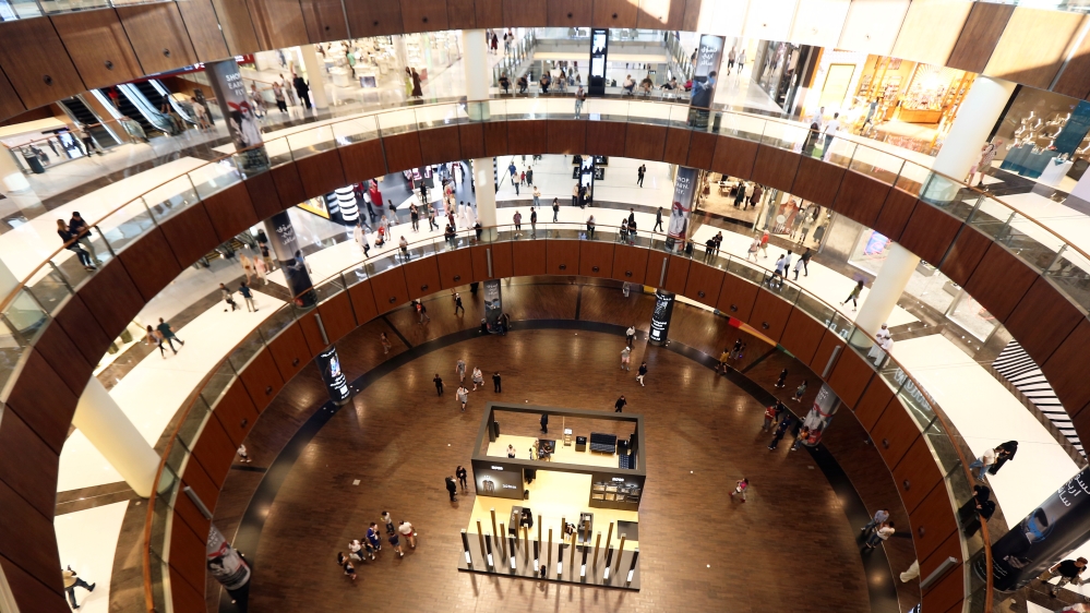 People shop at The Dubai Mall in Dubai