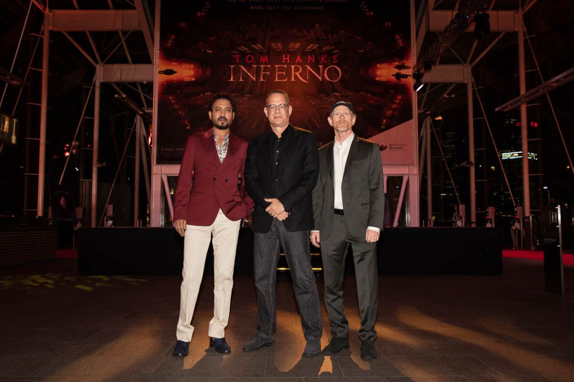 SINGAPORE - JUNE 14: (L-R) Actors Irrfan Khan, Tom Hanks and director Ron Howard attend the "Inferno" red carpet and photo call at the ArtScience Museum at Marina Bay Sands on June 14, 2016 in Singapo