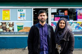 Jawad Javed and his wife Asiyah have been handing out free care packages since the coronavirus crisis escalated in March.. [Sobhan Sheikh/Al Jazeera]