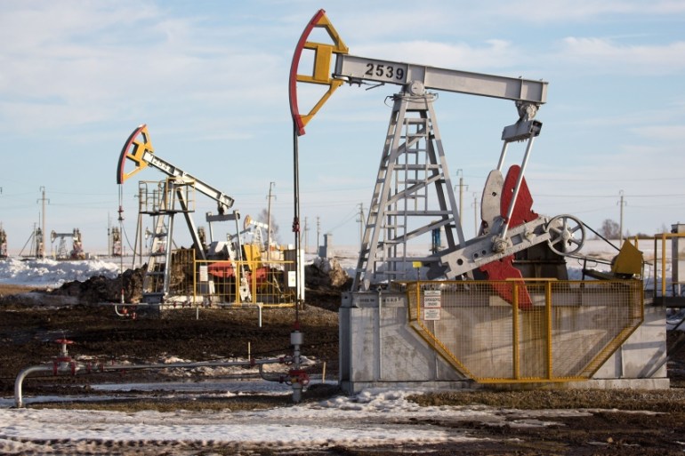 Oil pumping jacks, also known as "nodding donkeys", operate in an oilfield near Almetyevsk, Tatarstan, Russia, on Wednesday, March 11, 2020. Saudi Aramco plans to boost its oil-output capacity for the