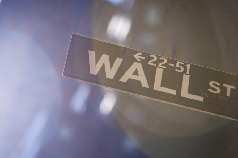 A Wall Street sign is