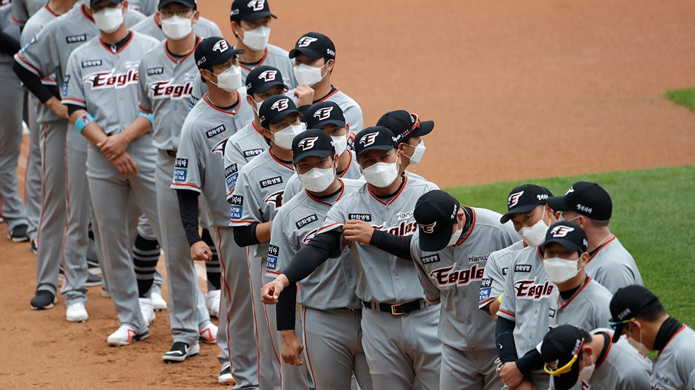 Coronavirus S Korea baseball league reopens in empty stadiums Coronavirus pandemic Al Jazeera