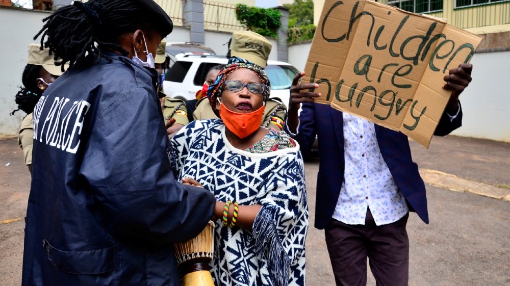 Ugandan academic Stella Nyanzi and activists protest against the way that government distributes the relief food and the lockdown situation to control the spread of 