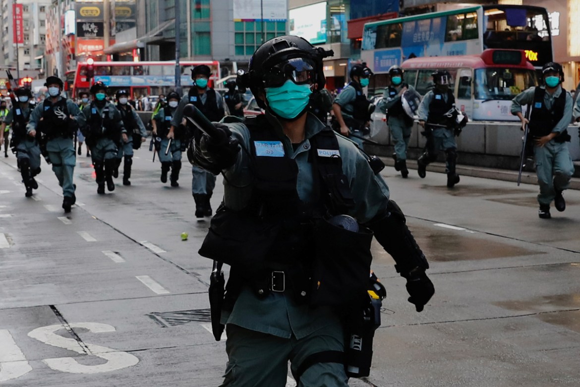 Riot police disperse anti-government protesters during a protest at Mong Kok in Hong Kong, China May 10, 2020. REUTERS/Tyrone Siu