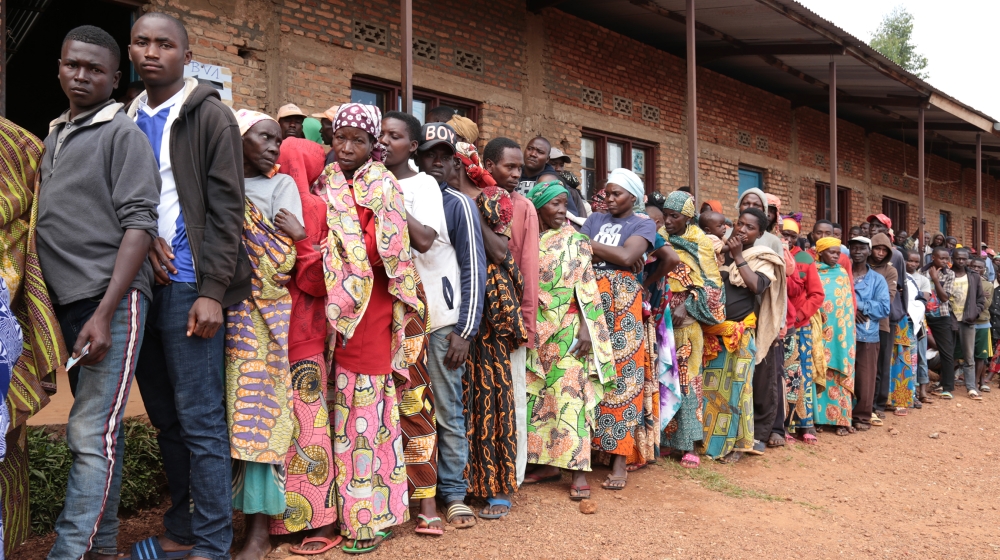 Burundians wait in a line to vote during the presidential and general elections at a polling station at the Bubu Primary school in Giheta, central Burundi, on May 20, 2020. The United States said TMay