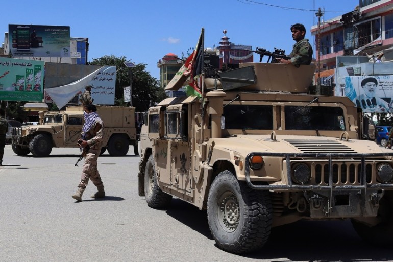 Afghan security forces sit in a Humvee vehicle amid ongoing fighting between Taliban militants and Afghan security forces in Kunduz on May 19, 2020. Afghan security forces on May 19 repelled a fierce