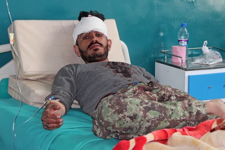 A wounded Afghan National Army (ANA) soldier rests inside a hospital after an attack on Afghan army base in Gardez, capital of Paktia province on May 14, 2020. - The Taliban said it carried out a dead