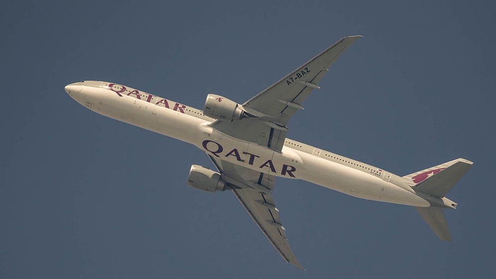 Qatar Airways Boeing 777 aircraft Flying from Doha to Kuwait on March 7, 2020 [Sorin Furcoi/Al Jazeera] 