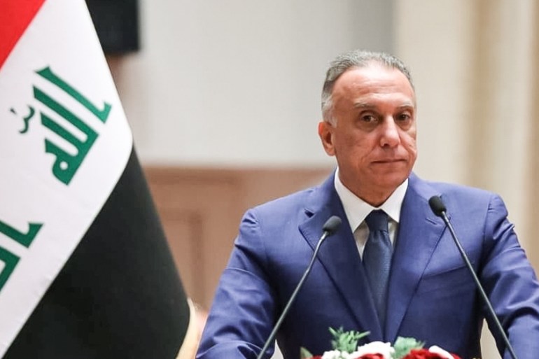 Iraqi Prime Minister-designate Mustafa al-Kadhimi delivers a speech during the vote on the new government at the parliament headquarters in Baghdad, Iraq, May 7, 2020. Iraqi Parliament Media Office/Ha