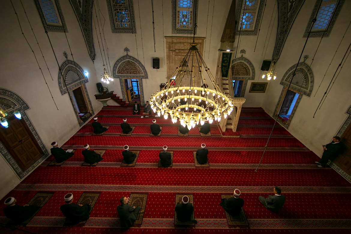 Kosovo Imams keeping social distance pray at the grand mosque for an Eid al Fitr prayer in Pristina, Kosovo on Sunday, May 24, 2020. Kosovo''s mosques have been closed since March 14 because of the spr
