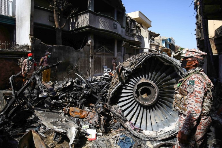 Wreckage of state run Pakistan International Airlines, Airbus A320 is lying amid houses of a residential colony days after it crashed, in Karachi, Pakistan, 24 May 2020. The death toll in a plane cras