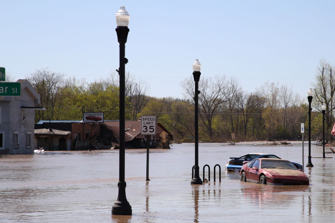 SANFORD, MICHIGAN - MAY 20: Main street is flooded after water from the Tittabawassee River breached a nearby dam on May 20, 2020 in Sanford, Michigan. Thousands of residents have been ordered to evac