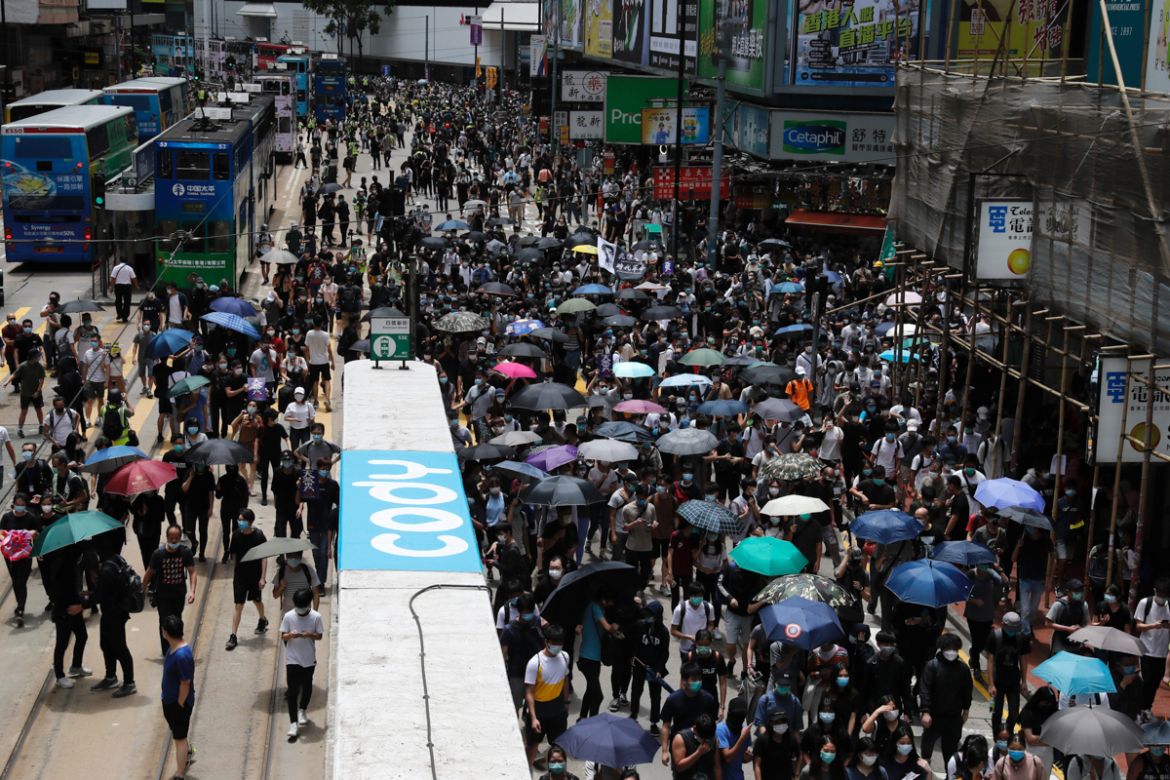 Anti-government protesters march against Beijing''s plans to impose national security legislation in Hong Kong, China May 24, 2020. REUTERS/Tyrone Siu