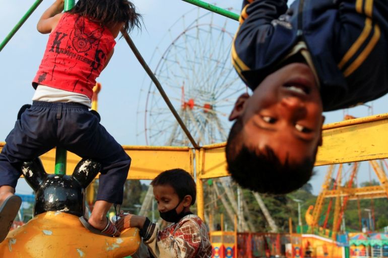 Children play at the closed amusement park during the thirteenth day of a lockdown imposed by the government amid concerns about the spread of the coronavirus disease (COVID-19), in Kathmandu