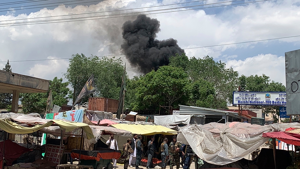 Smokes rises from a hospital after gunmen attacked in Kabul, Afghanistan, Tuesday, May 12, 2020. Gunmen stormed the hospital in the western part of the Afghan capital on Tuesday, setting off a gun bat