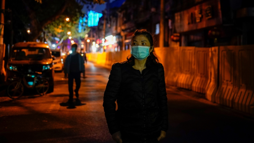 Woman wearing face mask in Wuhan China