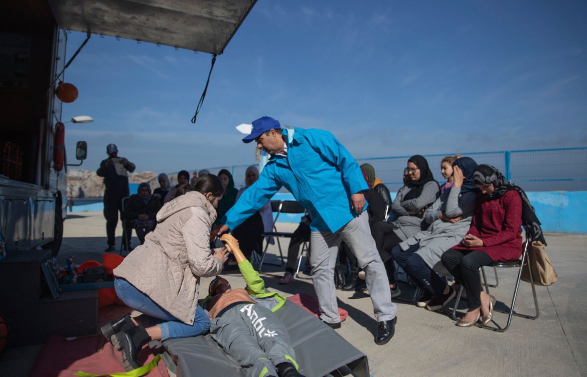 In this Tuesday, Feb. 11, 2020 photo, members of the first Moroccan female fishing cooperative receive first aid training in the village of Belyounech on the coast of the Mediterranean, northern Moroc