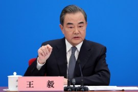 Chinese State Councillor and Foreign Minister Wang Yi speaks to reporters via video link at a news conference held on the sidelines of the National People''s Congress (NPC),
