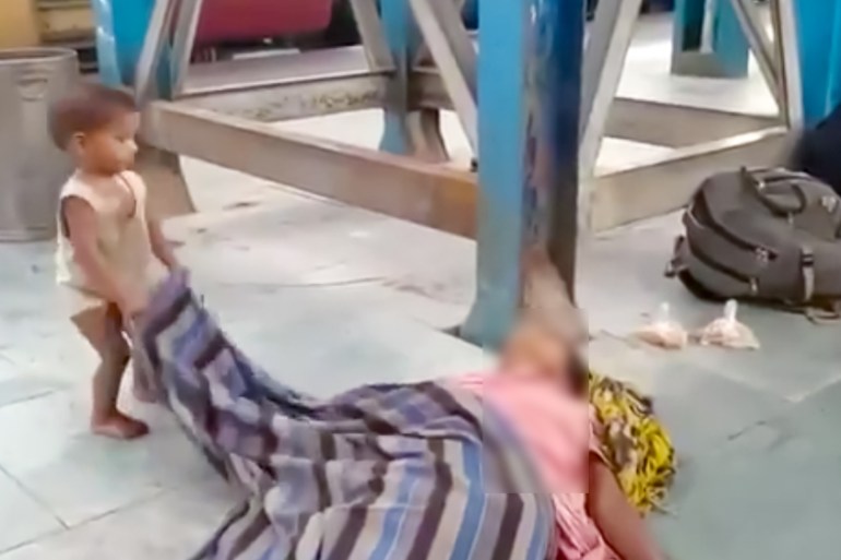 A toddler waking dead mother [Screengrab/Social media]