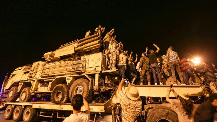 Libyan government displays destroyed air defense system used by warlord Haftar''s militias- - TRIPOLI, LIBYA - MAY 20: Libyan people gather at Martyrs Square to inspect Russian-made Pantsir-type air de