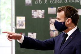 French President Macron visits a school in Poissy