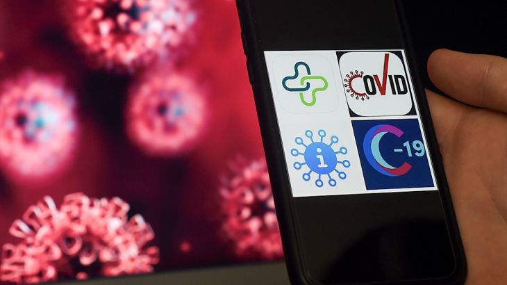 In this photo illustration Coronavirus tracking applications logos, Healthlynked Covid-19, Covid Symptom Tracker, Apple Covid-19, Covid-19 tracker, are seen displayed on a smartphone on April 10, 2020