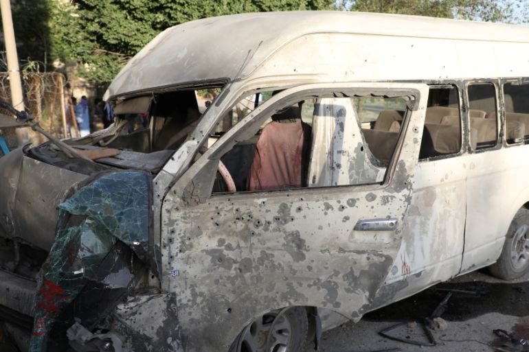A wreckage of a bus which carried employees of an Afghan television station and was bombed is seen in Kabul