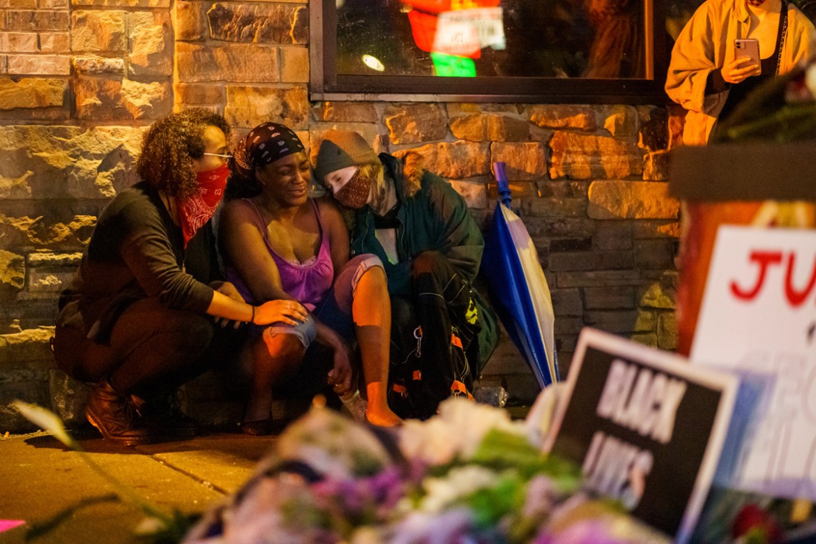 Shawanda Hill (C), the girlfriend of George Floyd reacts near the spot where he died while in custody of the Minneapolis Police, on May 26, 2020 in Minneapolis, Minnesota. - A video of a handcuffed bl