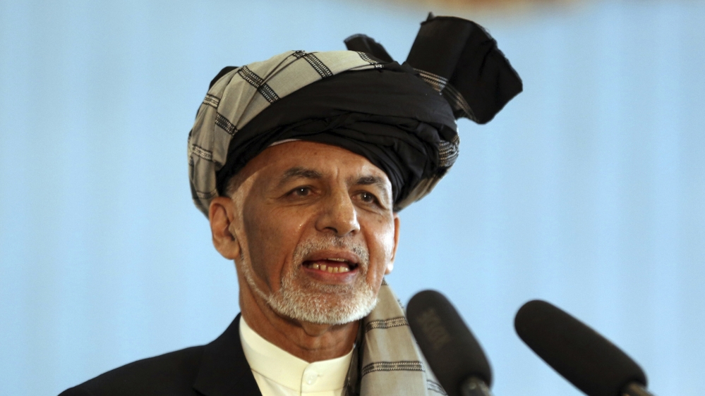 Afghan President Ashraf Ghani speaks to journalists after voting at Amani high school, near the presidential palace in Kabul, Afghanistan, Saturday, Sept. 28, 2019. Afghans headed to the polls on Satu