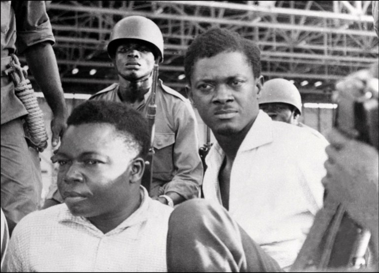Soldiers guard Patrice Lumumba (R), Prime Minister of then Congo-Kinshasa, and Joseph Okito (L), vice-president of the Senate, upon their arrest in December 1960 in Leopoldville (now Kinshasa). Lumum