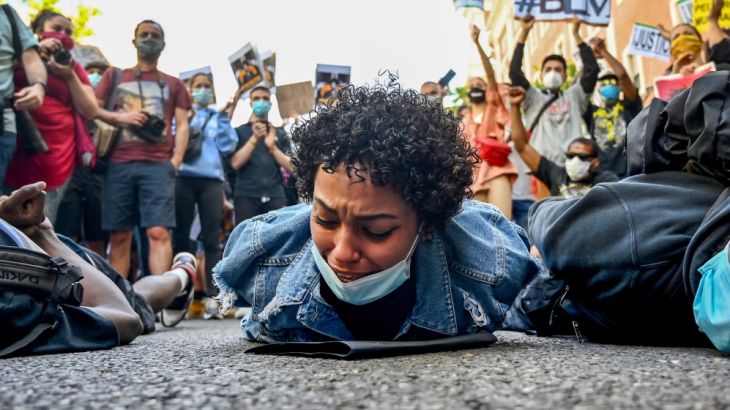 Protesters take part in a demonstration in Madrid, on June 7, 2020, against racism and in solidarity with the Black Lives Matter movement, in the wake of the killing of George Floyd, an unarmed black