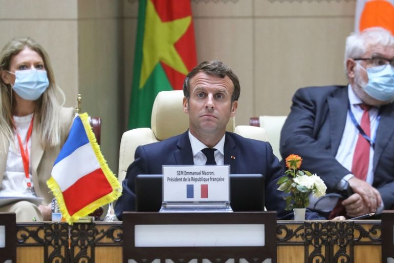 French President Emmanuel Macron takes part in a working session with leaders of the G5 Sahel West African countries during the G5 Sahel summit in Nouakchott