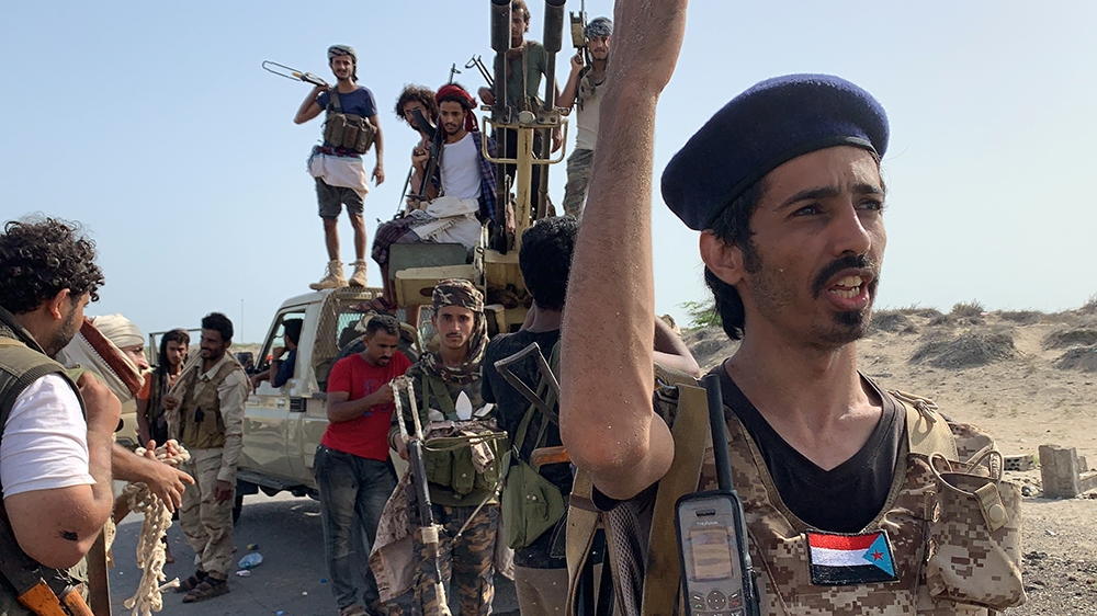 Fighters loyal to Yemen's Southern Transitional Council (STC) separatists gather at the frontline during clashes with pro-government forces for control of Zinjibar, the capital of the southern Abyan 