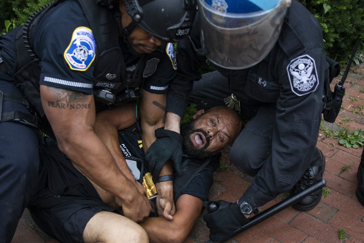 WASHINGTON, DC - JUNE 22: Protesters clash with U.S. Park Police after protesters attempted to pull down the statue of Andrew Jackson in Lafayette Square near the White House on June 22, 2020 in Washi