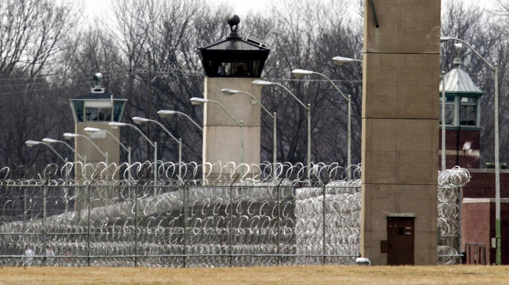 In this March 17, 2003 file photo, guard towers and razor wire ring the compound at the U.S. Penitentiary in Terre Haute, Ind., the site of the last federal execution. Democratic presidential candidat