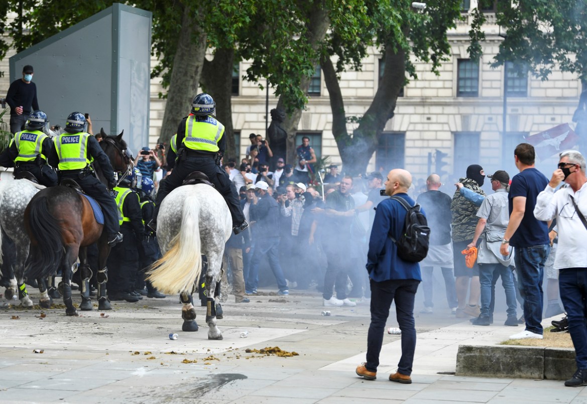Counter-protesters clash with police ahead of a Black Lives Matter protest following the death of George Floyd in Minneapolis police custody, in London, Britain, June 13, 2020. REUTERS/Dylan Martinez