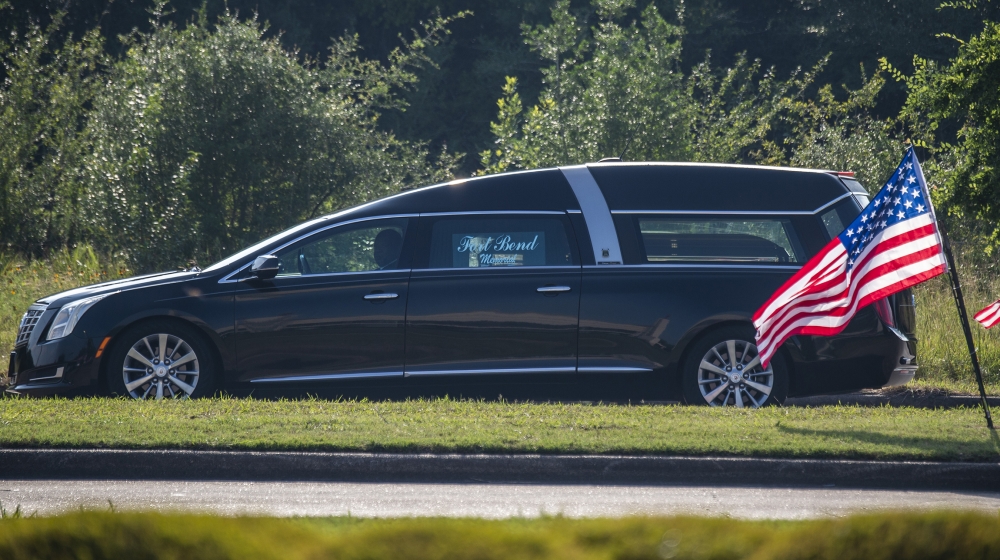 The hearse carrying the coffin arrives at the church for the funeral for George Floyd on June 9, 2020, at The Fountain of Praise church in Houston, Texas. Floyd died after being restrained by Minneapo
