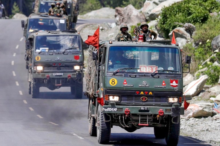 An Indian Army convoy moves along a highway leading to Ladakh, at Gagangeer in Kashmir''s Ganderbal district June 18, 2020. REUTERS/Danish Ismail